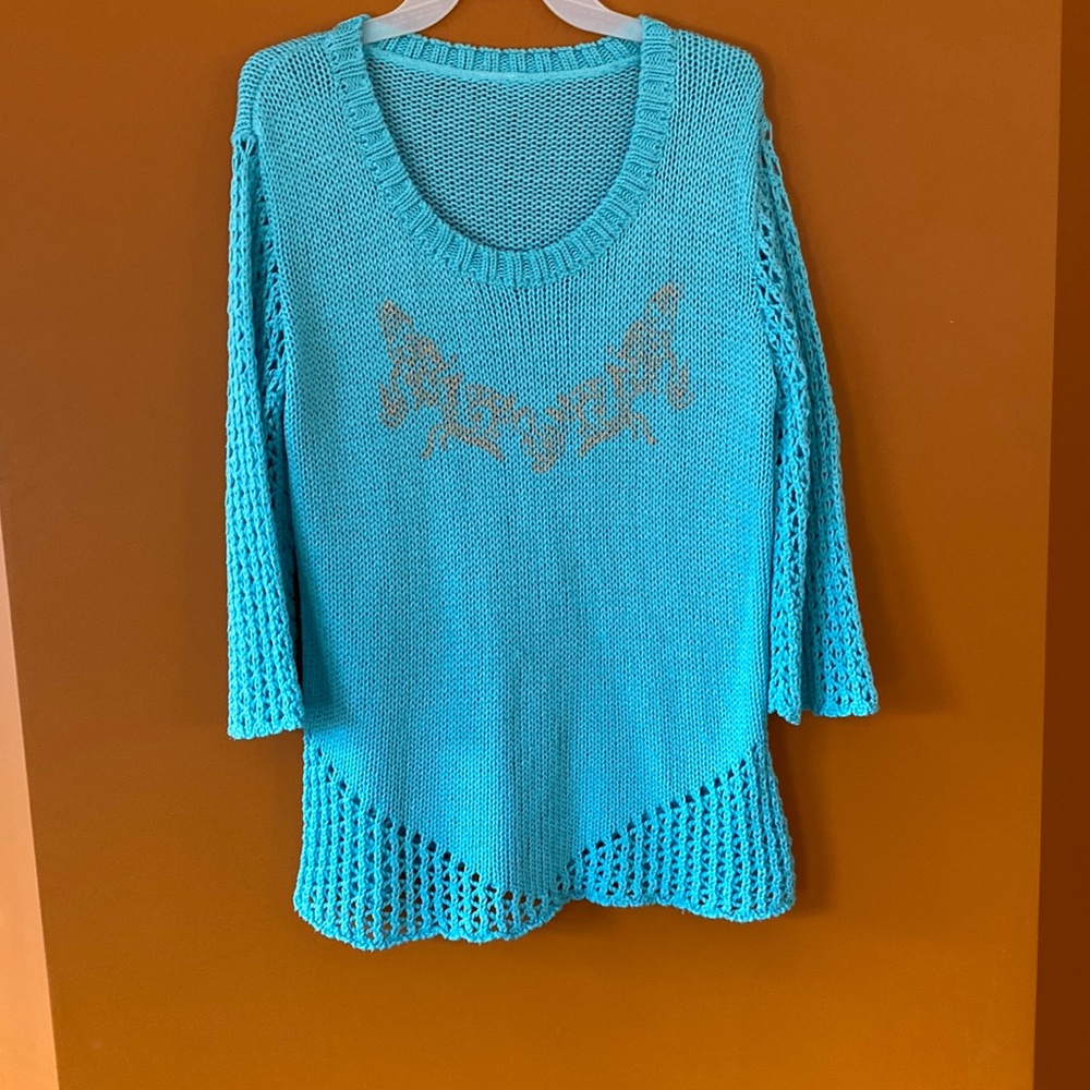2/$20. Ladies crocheted sweater in size medium teal blue.